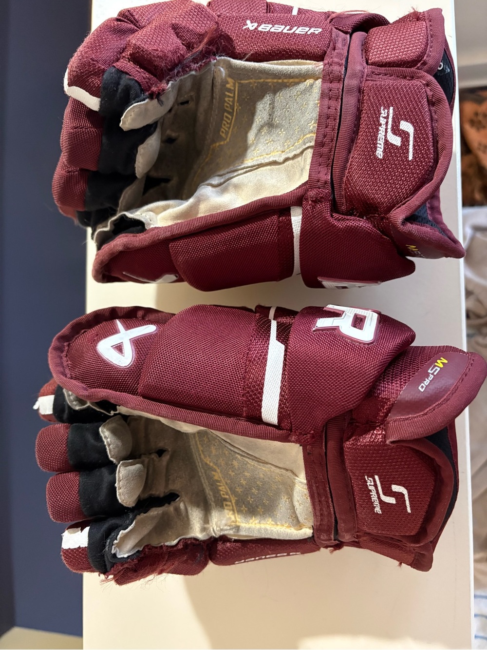 Bauer Maroon and White Ice Hockey Gloves